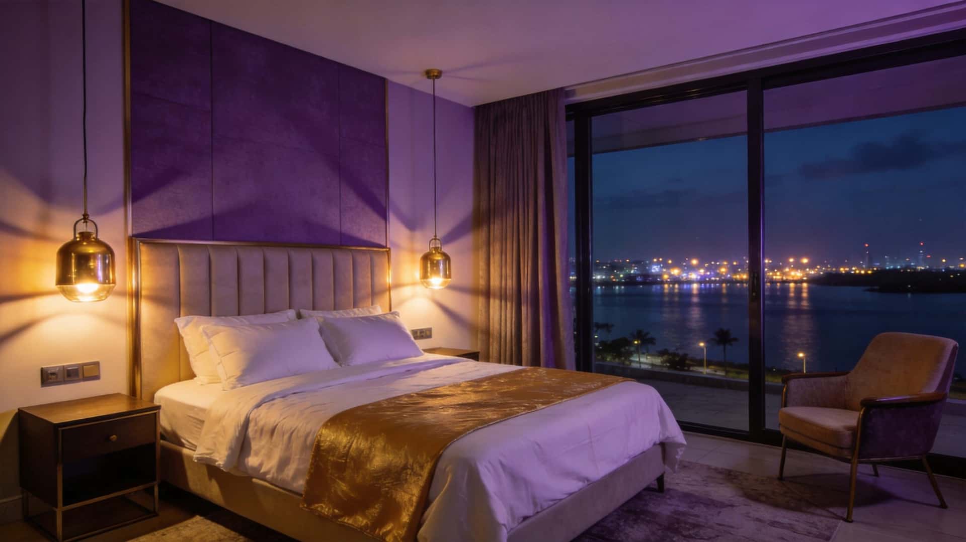 Luxury shortlet bedroom overlooking the lagoon at night